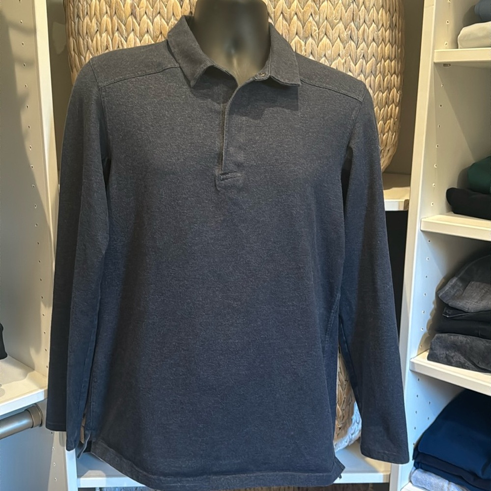 Arc’Teryx medium dark gray pullover shirt in very good condition.